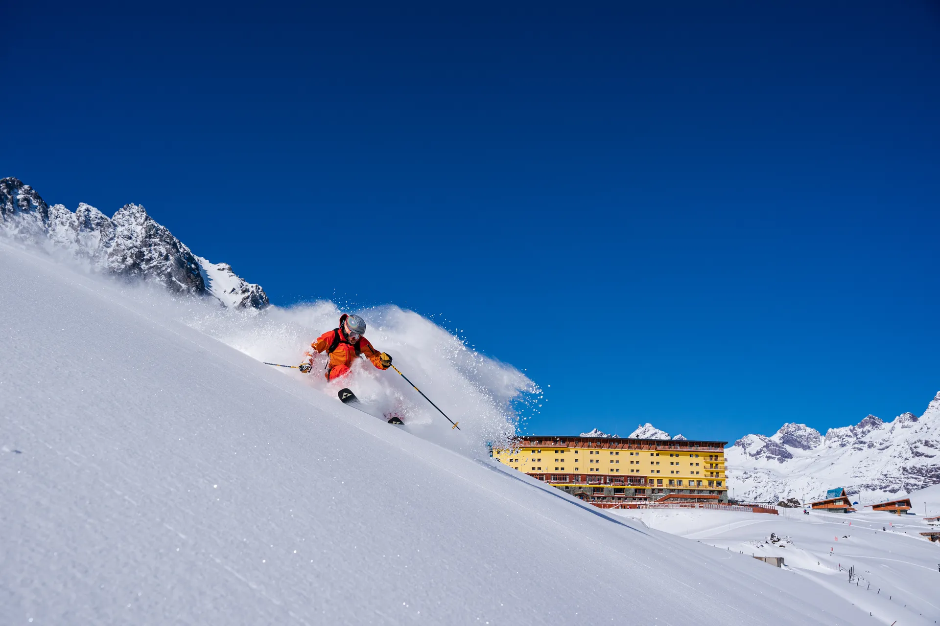 Powder turn with Hotel Portillo backdrop