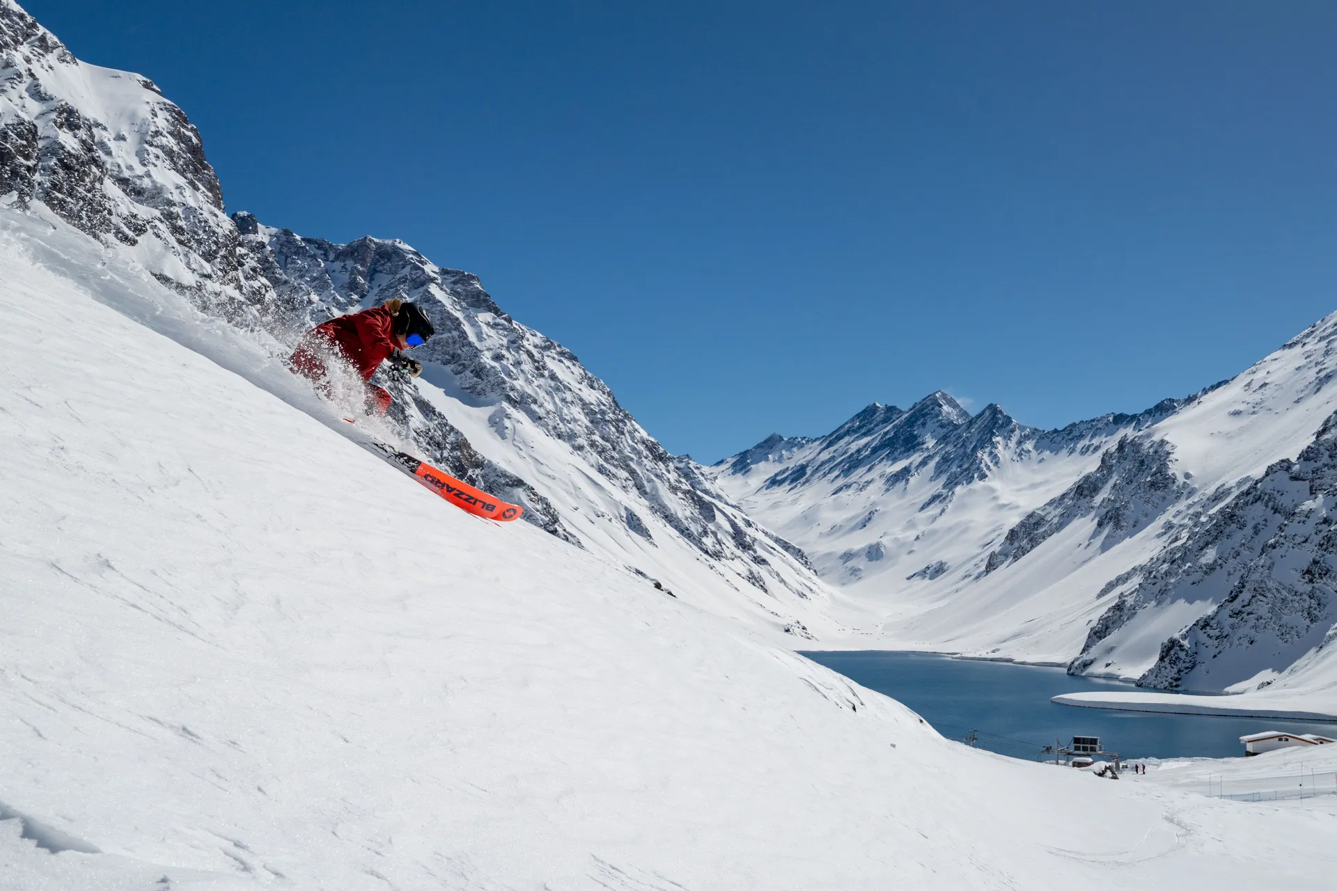 Snowboarder with dramatic mountain backdrop